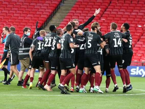 Cobblers celebrate promotion at Wembley.