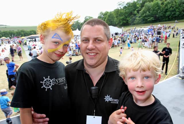 HOR 030710 Odyssey 2010. Organiser Anthony Hutchings with his sons Tommy 8, left and Danko 5. photo by derek martin