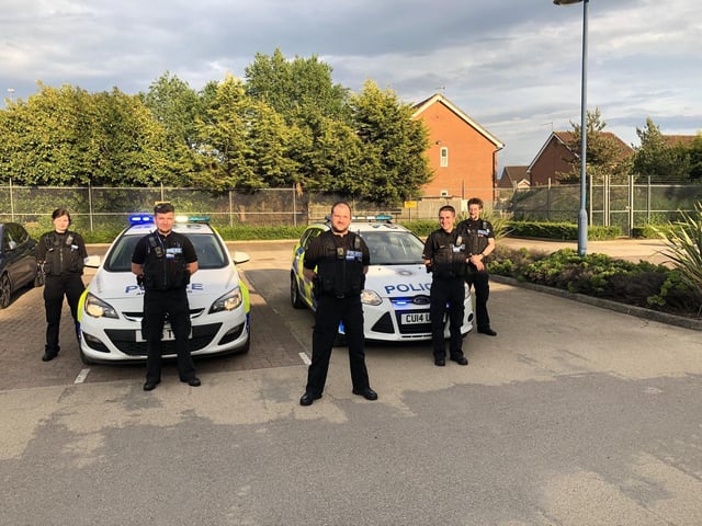 Members of the Northamptonshire Special Constabulary get ready to take part in patrols in Northampton