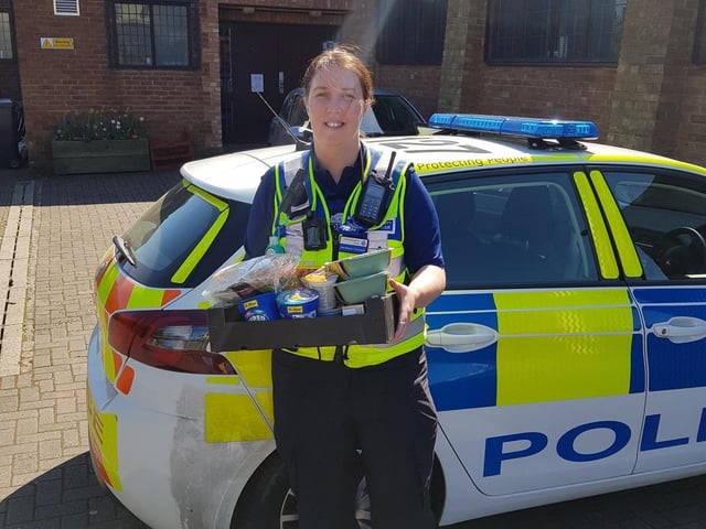 Police Community Support Officer Dot Wilson-Townsend from the Northampton Neighbourhood Policing Team helps to deliver food parcels to vulnerable members of the community