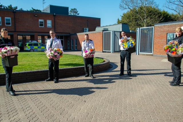 Sergeant Ellie Baird, Superintendent Elliot Foskett, Inspector Mark Holland, PC Dan Farndon and Superintendent Sarah Johnson organised for bunches of flowers gifted to Northamptonshire Police by Tesco at Mereway, were passed on to other keyworkers helping to keep the county safe