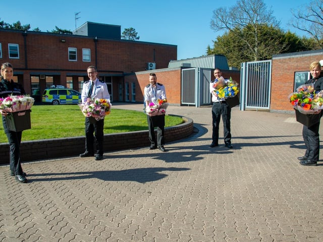 Sergeant Ellie Baird, Superintendent Elliot Foskett, Inspector Mark Holland, PC Dan Farndon and Superintendent Sarah Johnson organised for bunches of flowers gifted to Northamptonshire Police by Tesco at Mereway, were passed on to other keyworkers helping to keep the county safe