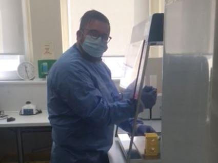 David Young carries out Covid-19 testing