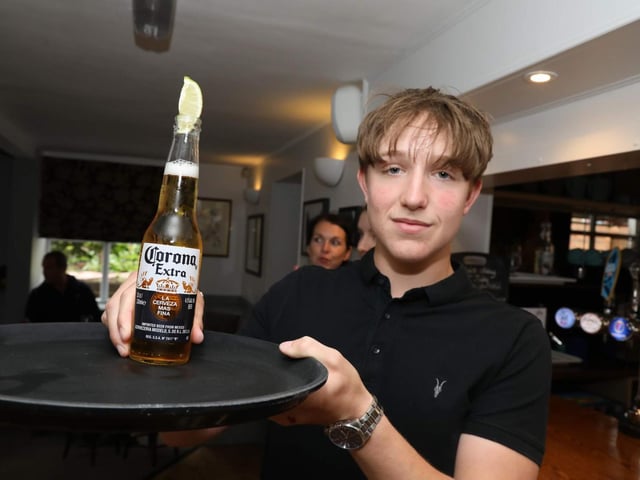 Jacob Pepper providing table service at The Lilacs in Isham