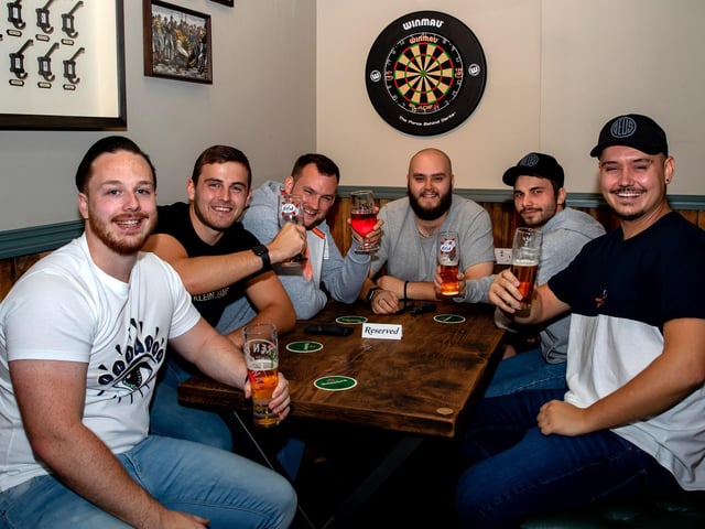 Friends finally reunited to have a drink. Photo: Leila Coker.