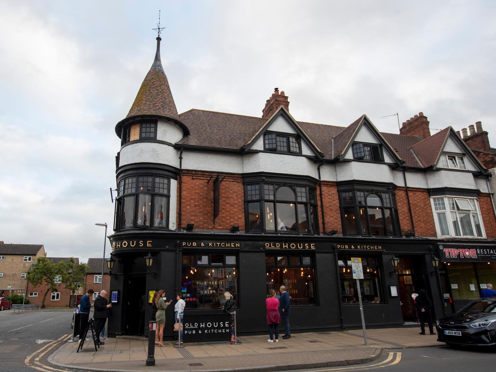 Customers waited to be let in The Old House in Wellingborough Road. Photo: Leila Coker.