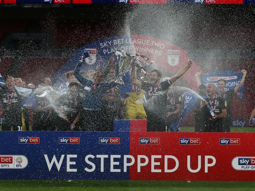 Cobblers celebrate promotion at Wembley.