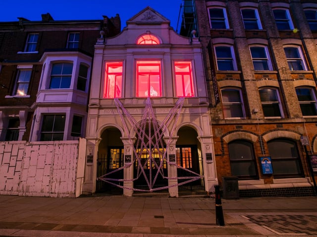 The Royal theatre entrance was lit up red and covered in pink tape for the similar Scene Change campaign. Photo: Leila Coker