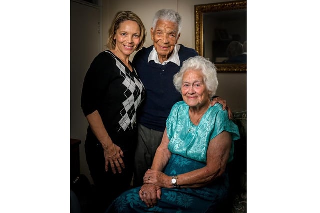 Earl Cameron celebrating his 100th birthday with his family.