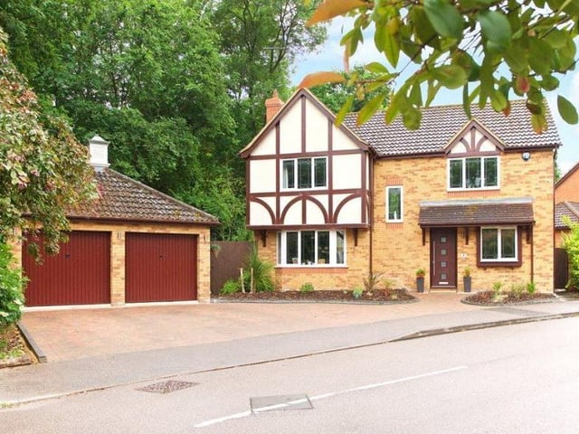 Woodland Walk, OVERSTONE — This four bedroom detached house has off street parking and an enclosed garden with access to private woodland. The 1,875 sq ft of accommodation has wooden style flooring throughout the ground floor, an entrance hall, a study overlooking the front, and a cloakroom. The double garage has been converted to a room that is currently used as gym but could have potential for office space. Michael Graham, Northampton