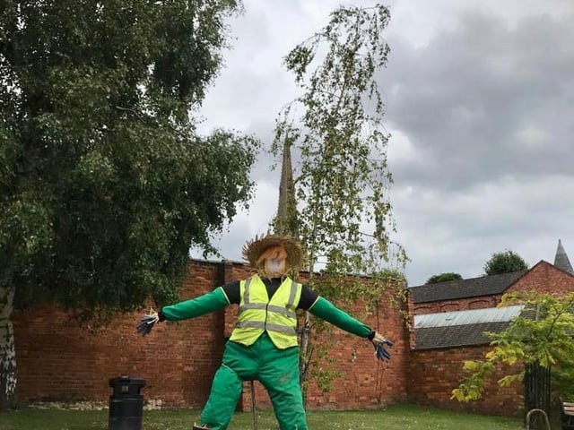 The scarecrows and flower pot people are in different locations across the town
