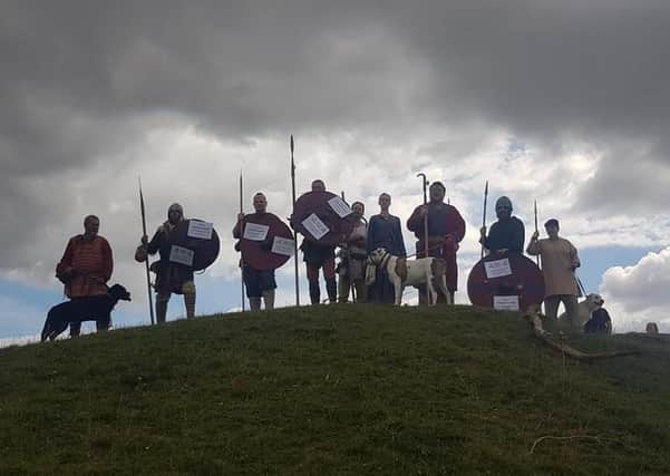 An Anglo Saxon reenactment group took to the hills of Kingley Vale to raise money for struggling local heritage sites on Sunday SUS-200714-155632001