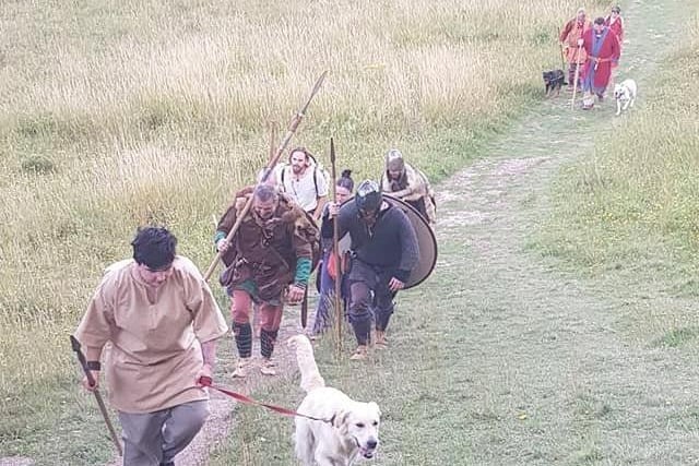 An Anglo Saxon reenactment group took to the hills of Kingley Vale to raise money for struggling local heritage sites on Sunday SUS-200714-155648001