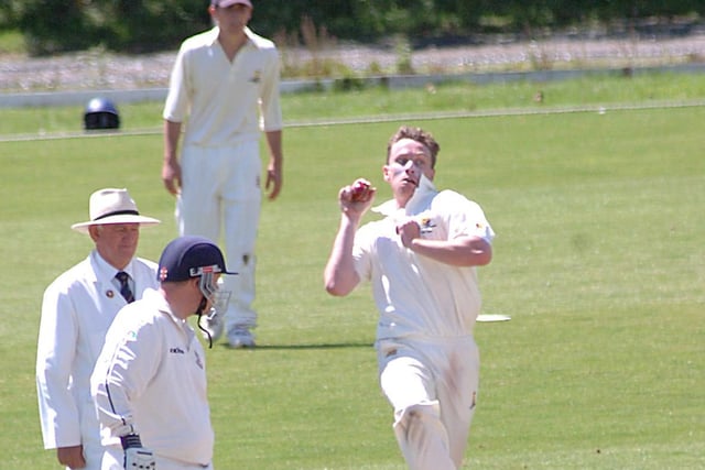 John Morgan bowling against Eastbourne, with Paul Stevens at the non-striker's end
