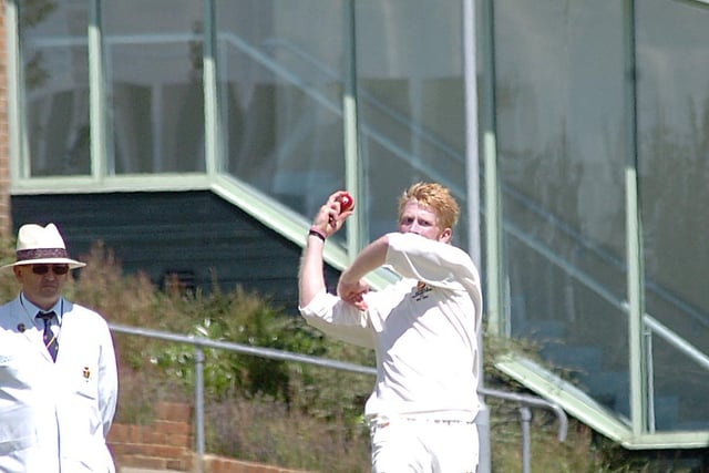 More action of Dan Cooke bowling for Hastings against Eastbourne