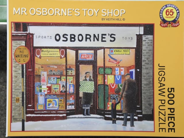Rushden artist Keith Hill's painting has been reproduced as a special edition jigsaw - the logo was designed by Clive Wood