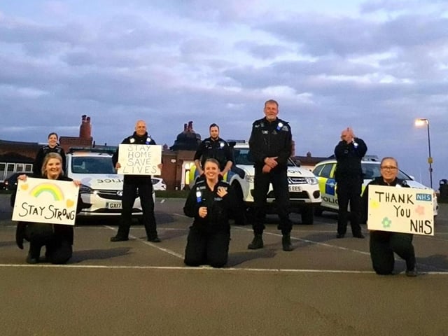 Hastings and Rother PCSOs outside the De La Warr Pavilion towards the start of lockdown at the first clap for carers