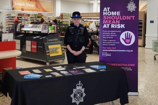 PCSO Kirsty Jackson in Broadbridge Heath, Horsham, raising awareness and offering support for those affected by DA during lockdown, along with photo of her with a DA stand in a supermarket in Horsham.