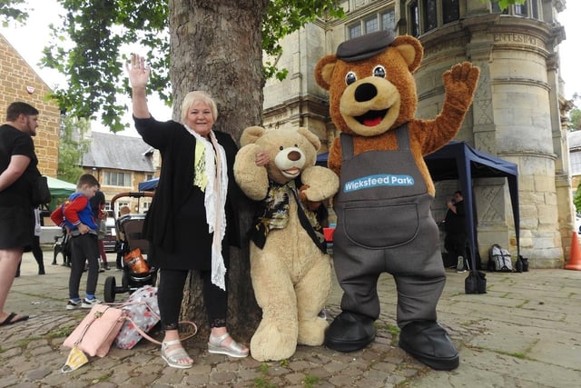 Raffle prize winner June Clifford and her giant bear and Wicky Bear. Photo by Andrew Carpenter