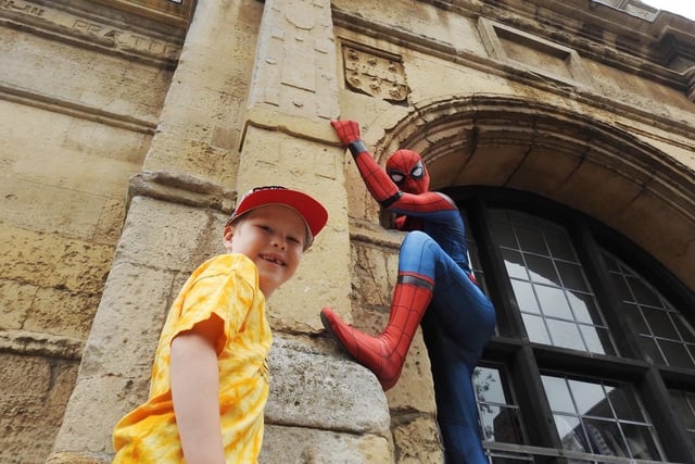 Jacob Owen aged six meets Spiderman during the fundraising event for Wicksteed Park in Rothwell on Saturday. Photo by Andrew Carpenter