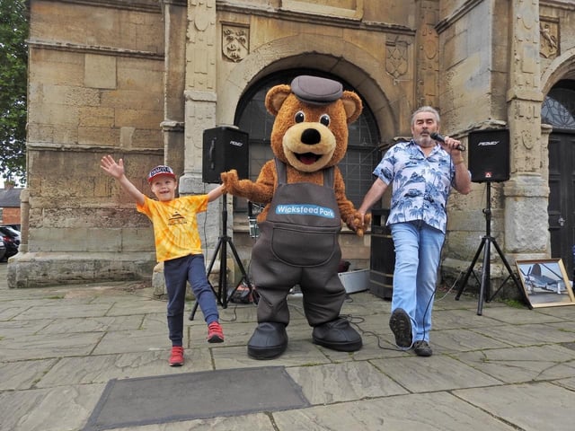 Jacob Owen 6, Wicky Bear and Barry Hale during the fundraiser in Rothwell on Saturday for Wicksteed Park. Photo by Andrew Carpenter
