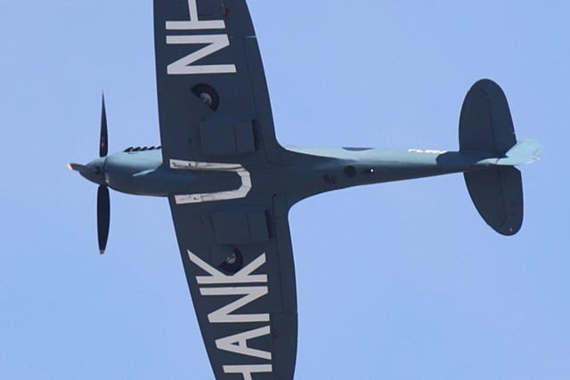 NHS Spitfire flies over Worthing. Picture: Eddie Mitchell SUS-200108-152909001