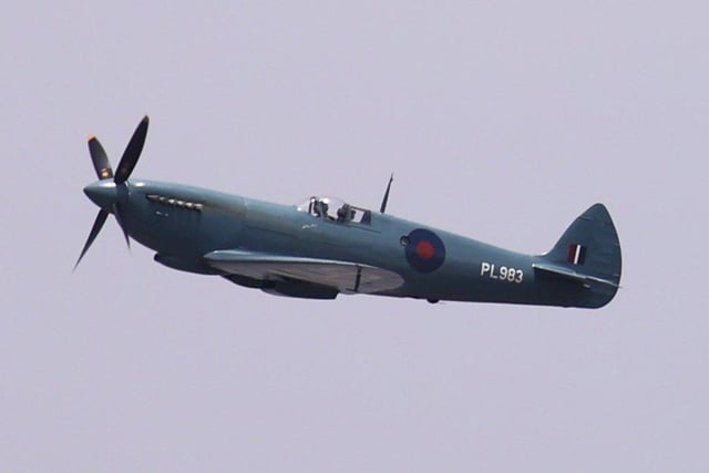 NHS Spitfire flies over Worthing. Picture: Eddie Mitchell SUS-200108-152950001