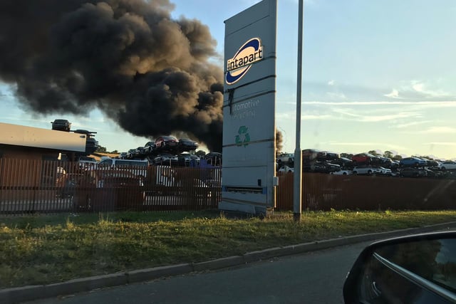 Passing motorists got a close-up view of the fire at Intapart Automotive Recycling. Photo: Judy Mansfield