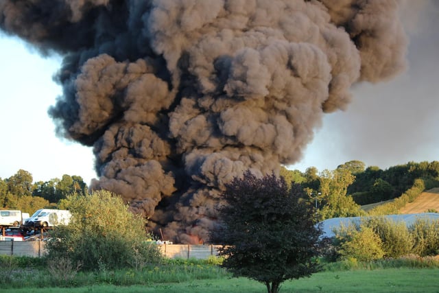 Black smoke obliterated the blue skies over Daventry as the blaze took hold. Photo: Finbarr Swann