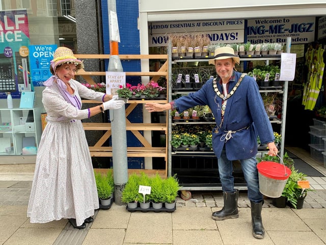 Worzel and Aunt Sally enjoying a wander down Rushden High Street