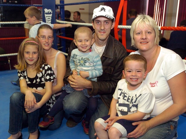 Emma, Shannon, Andy and Chelsea Knighton with Sam and Zach Knighton-Smith, Chelsea's cousin who also died from neuroblastoma