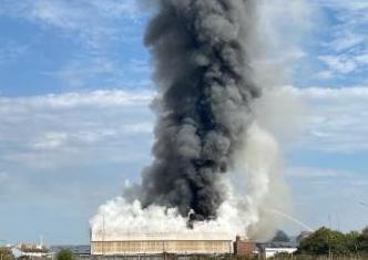 A large fire has broken out in an industrial building Newhaven. Photo:@montysmugs