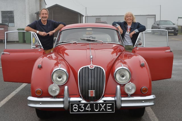 Paul and Roma Handley with their 1959 XK150S Jaguar.