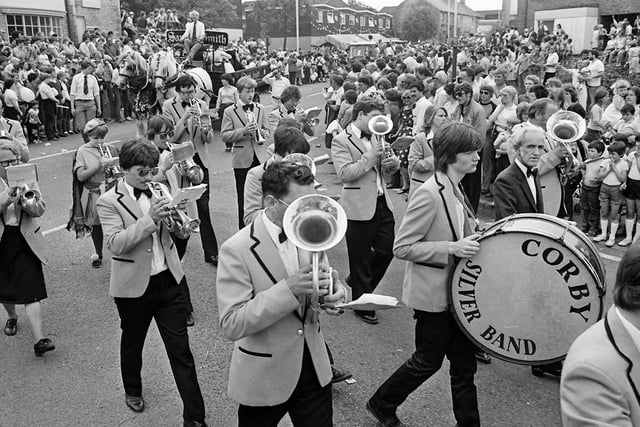 Corby Silver Band walks from High Street into The Jamb