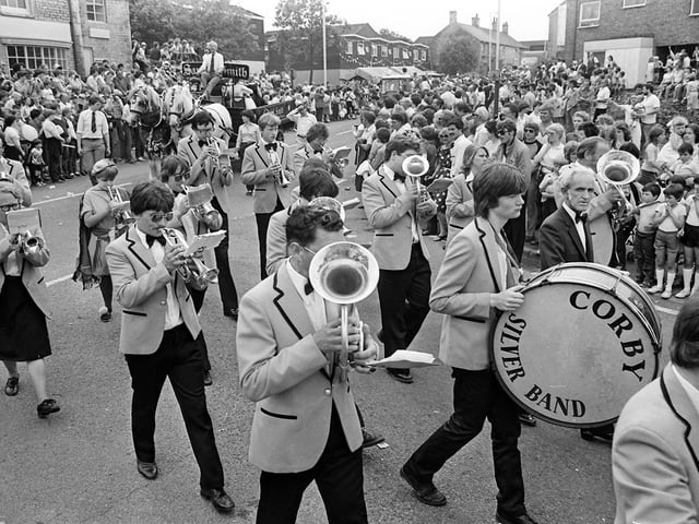 Corby Silver Band walks from High Street into The Jamb