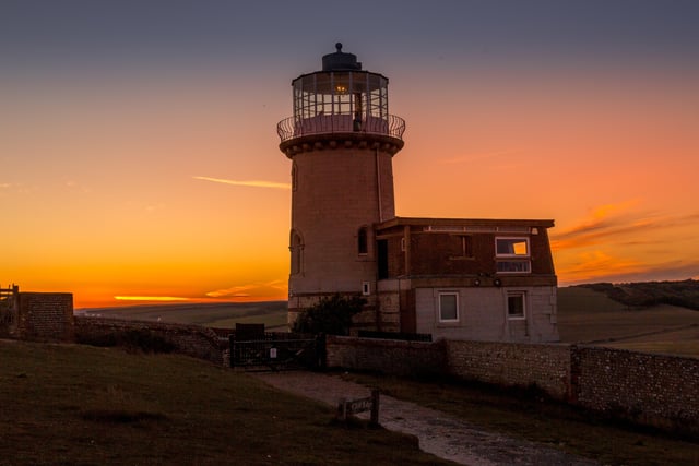 A glorious sunset at the former Belle Tout lighthouse at Beachy Head, taken by Barry Davis on a Canon EOS 5d camera. SUS-200826-121224001