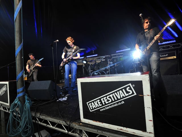 Temallica on the stage during 2010's Fake Festival in Boston.