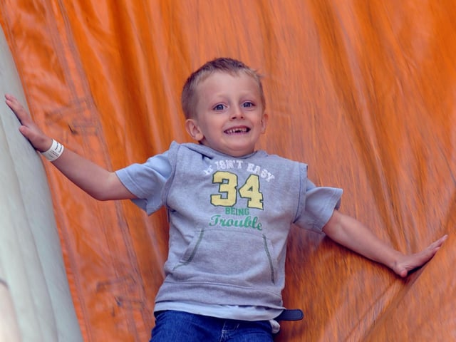 Ashton Keal, six, on the slide.