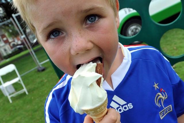 Jack Burgess, seven, tucks into an ice cream.