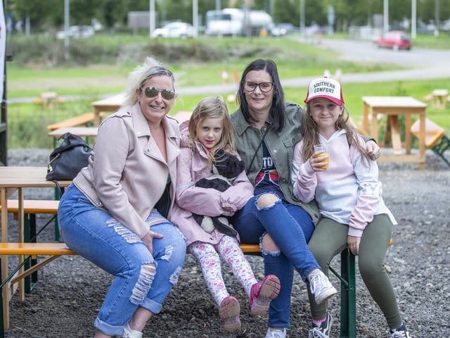 A family enjoys a drink at Smoke Street