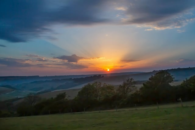 Glorious sunset on the Downs at Butts Brow,  taken by Barry Davis on a Canon EOS 5d camera. SUS-200209-111321001