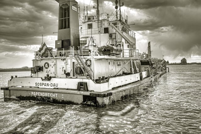 Sospan Dau dredging at Sovereign Harbour's marina earlier this year, by Ralph Davies. SUS-200209-114955001