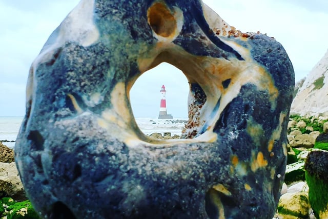 This unusual view of Beachy Head Lighthouse was taken by Fiona Coutts. SUS-200209-105128001