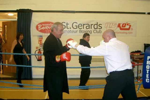 Coach Billy Lavelle sizing up to Alan Minter for old times sake at St Gerards Boxing Club presentation night.