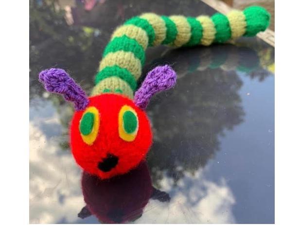 Craftspeople have joined forces to create a knitted postbox topper trail around the town