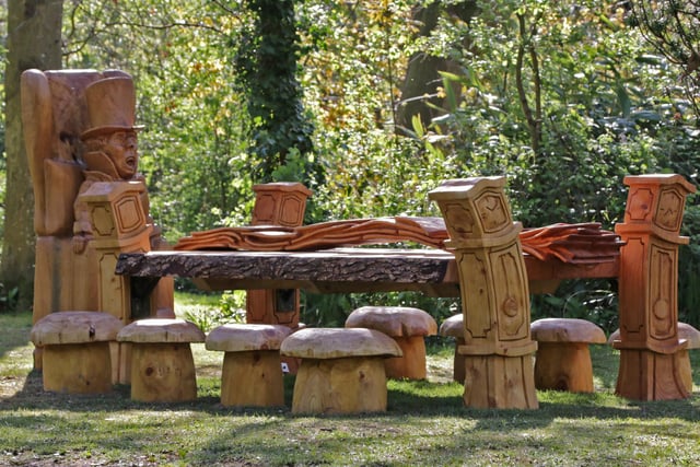 Taken in Hotham Park, Bognor Regis, by Neil Cooper, the Mad Hatters Table is a wooden sculpture commissioned by the former charity Hotham Park Heartage Trust, now Friends of Hotham Park.