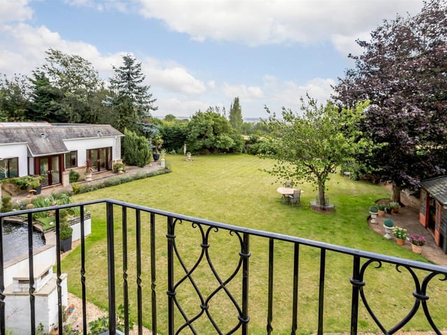 The view from the first-floor balcony of the garden at Meadowbank Lodge. Photo: Fine & Country