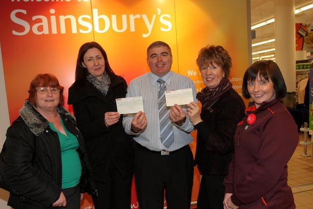 A cheque presentation from Sainsbury's in the Grosvenor Centre was presented to the British Heart Foundation and Cynthia Spencer Hospice in 2009. Pictured: Helen Rossiter, administrator from Sainsbury's, Kelly Fairnington, British Heart Foundation, James McKechnie, store manager, Sue Bownass from Cynthia Spencer Hospice and Donna Thomson, team leader from Sainsbury's.