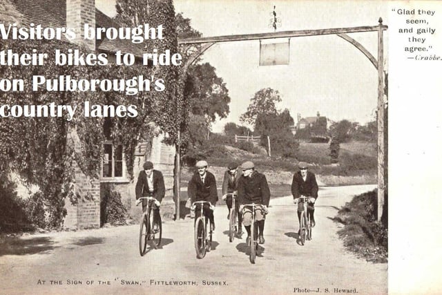 1910 circa - Cycling past the Swan at Fittleworth SUS-200916-091300001