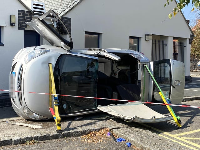 A car has flipped onto its side in the Surrey Street car park in Littlehampton
